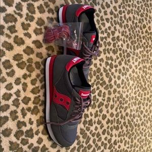 Grey and red Saucony sneakers. Size men’s 9